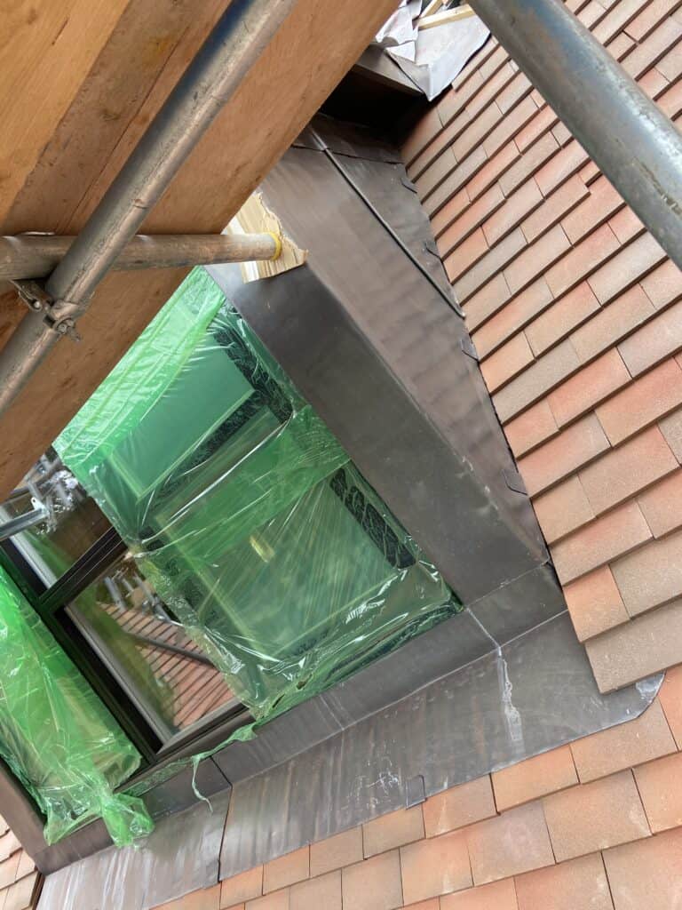 Building exterior under construction with scaffolding.